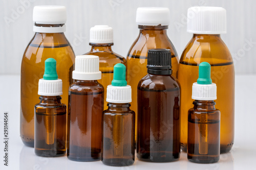Brown glass bottles with medicine or essential oil