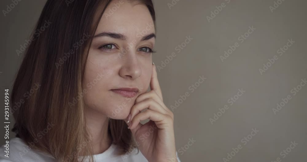 Portrait of young thoughtful woman with new idea. Portrait of young thoughtful woman with new idea.