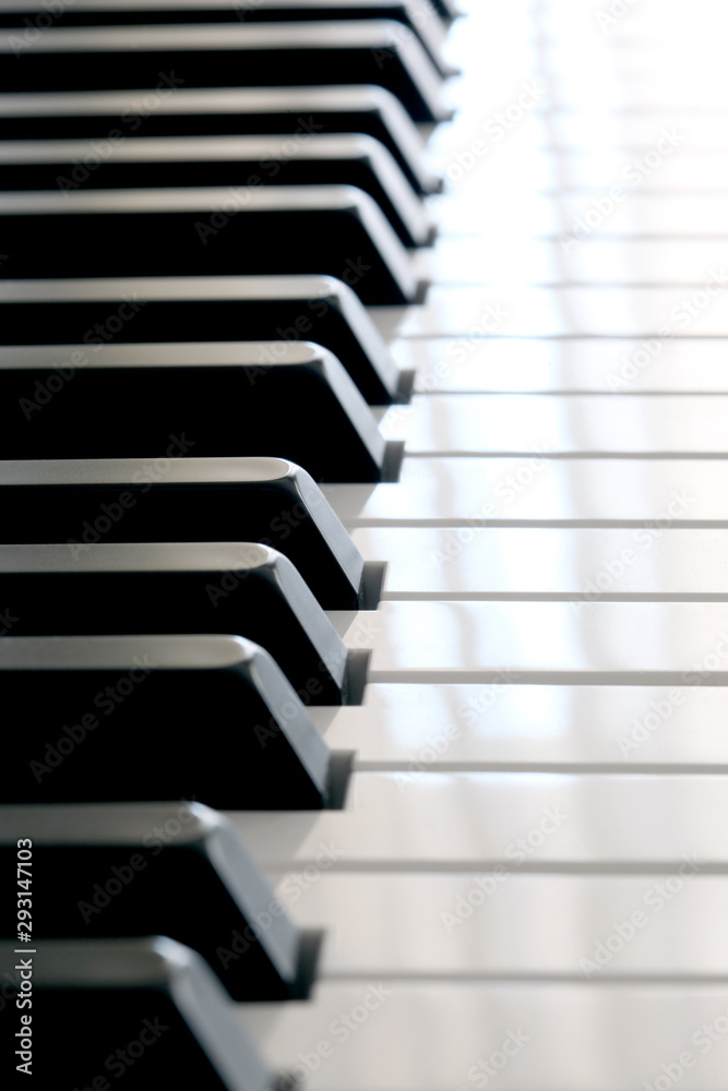 close up on a piano keyboard with copy space for your text close up on a piano keyboard with copy space for your text