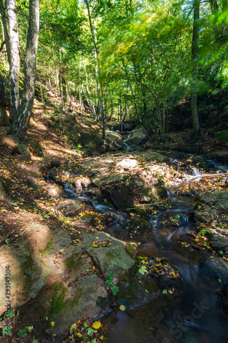 Small waterfalls  autumn nature surroundings Waterfall  D  rka  in the Czech forest landscape. 2