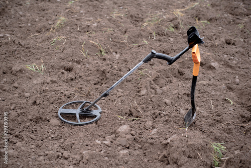 Wallpaper Mural Search for artifacts with a metal detector and a shovel Torontodigital.ca