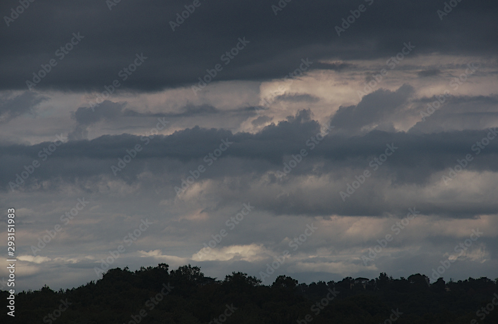 Threatening grey clouds on countryside Threatening grey clouds on countryside