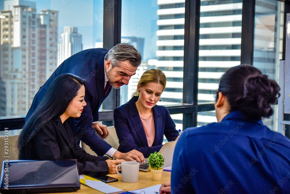 Business team working group meeting in office Business team working group meeting in office