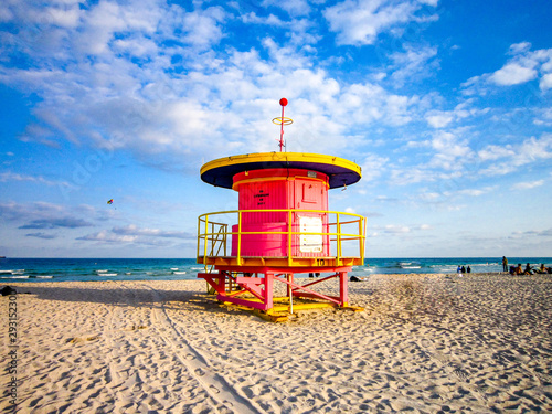 Pink and yellow lifeguard tower in the famous miami beach Florida