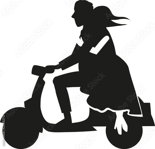 silhouette couple over a motorcycle photo