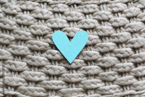 a little heart in the middle of woman bag texture