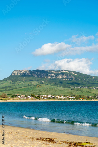 a view of one of the mountain peaks and skys seen from Bolonia beach in Cadiz, spain  © josehidalgo87