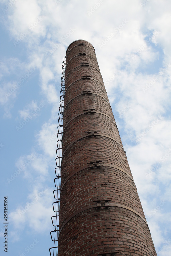 old brick chimney of a factory