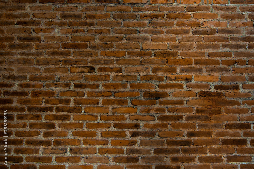 Red brown brick wall dark texture background. Red brown brick wall dark texture background.