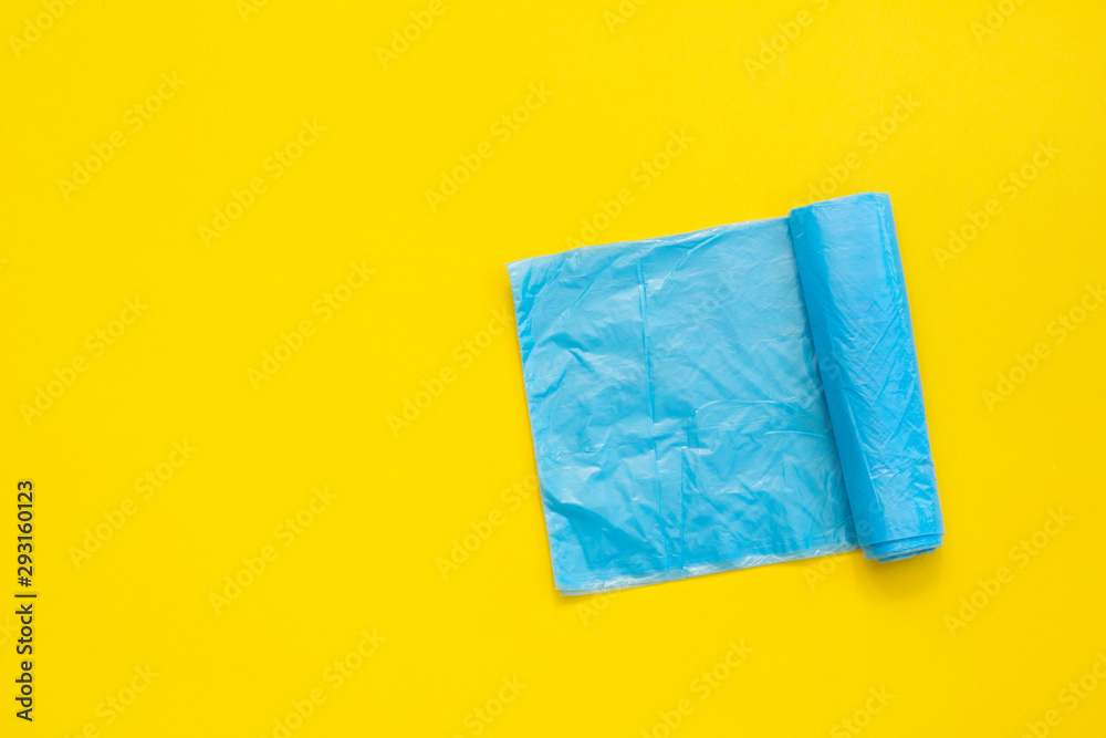 Garbage bag on a yellow background Garbage bag on a yellow background
