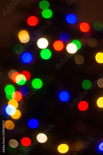 Christmas multi-colored lights on a black background, winter, bokeh, background