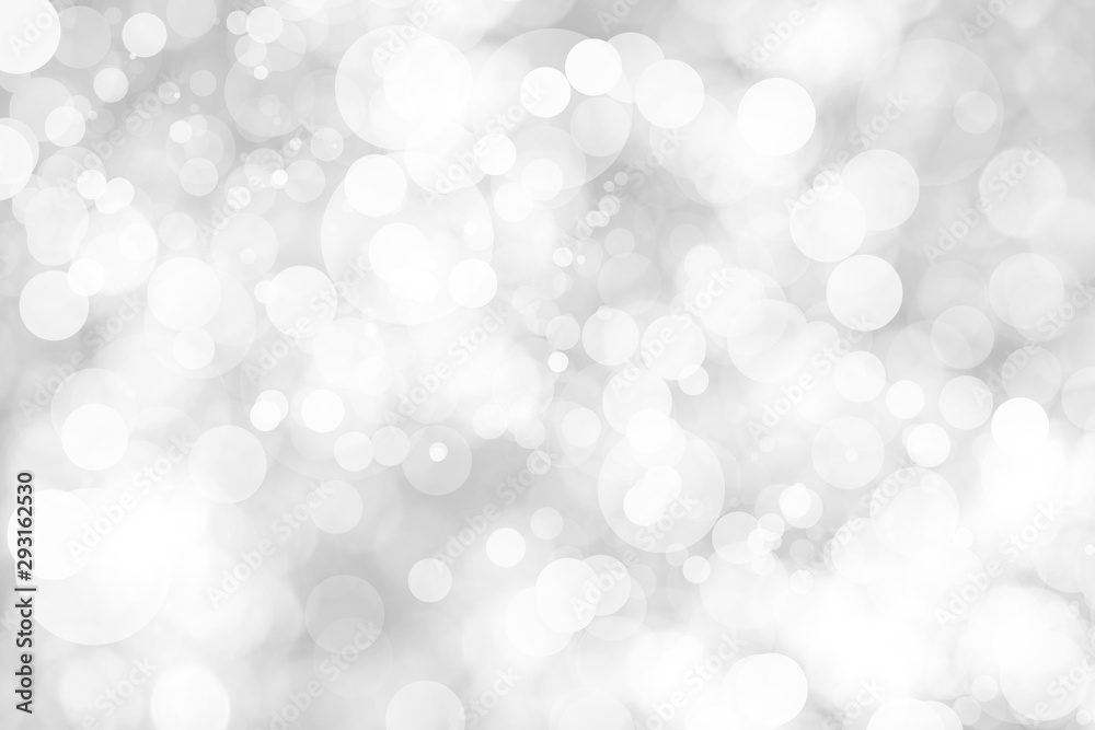 Abstract background with White bokeh on gray background. christmas blurred beautiful shiny Christmas lights. Abstract background with White bokeh on gray background. christmas blurred beautiful shiny Christmas lights.