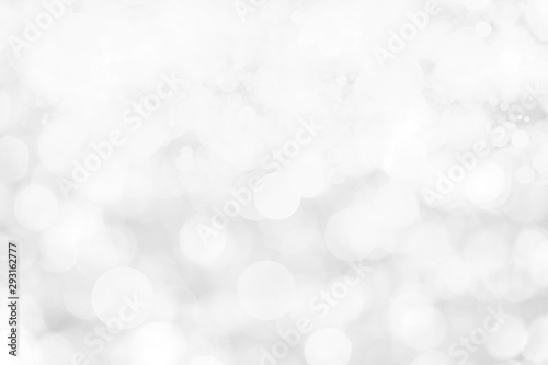 Abstract background with White bokeh on gray background. christmas blurred beautiful shiny Christmas lights.
