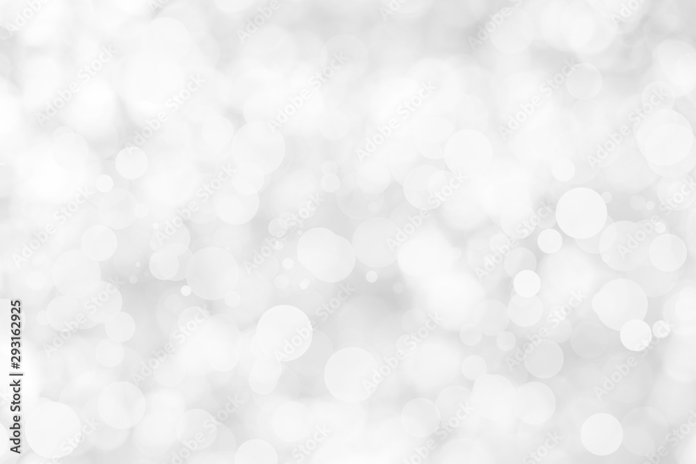 Abstract background with White bokeh on gray background. christmas blurred beautiful shiny Christmas lights. Abstract background with White bokeh on gray background. christmas blurred beautiful shiny Christmas lights.