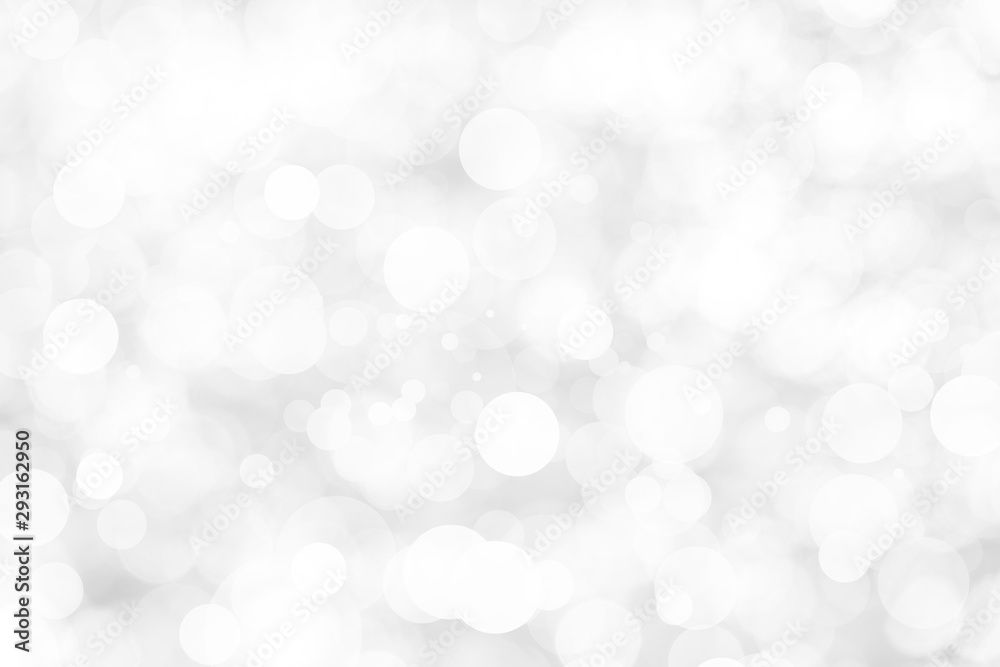 Abstract background with White bokeh on gray background. christmas blurred beautiful shiny Christmas lights. Abstract background with White bokeh on gray background. christmas blurred beautiful shiny Christmas lights.