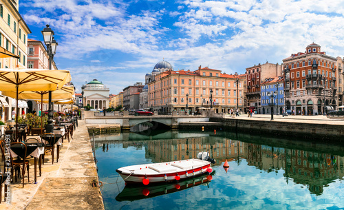 Landmarks and beautiful places (cities) of northern Italy - elegant Trieste with charming streets and canals photo