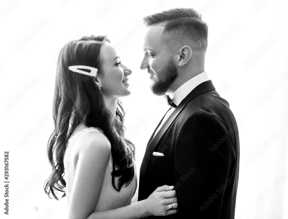 close up. happy bride and groom looking at each other close up. happy bride and groom looking at each other