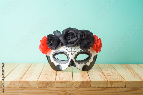 Day of the dead, Dia De Los Muertos, holiday concept with sugar skull mask on wooden table