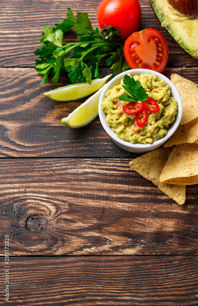 Avocado sauce guacamole with corn chips nachos Avocado sauce guacamole with corn chips nachos
