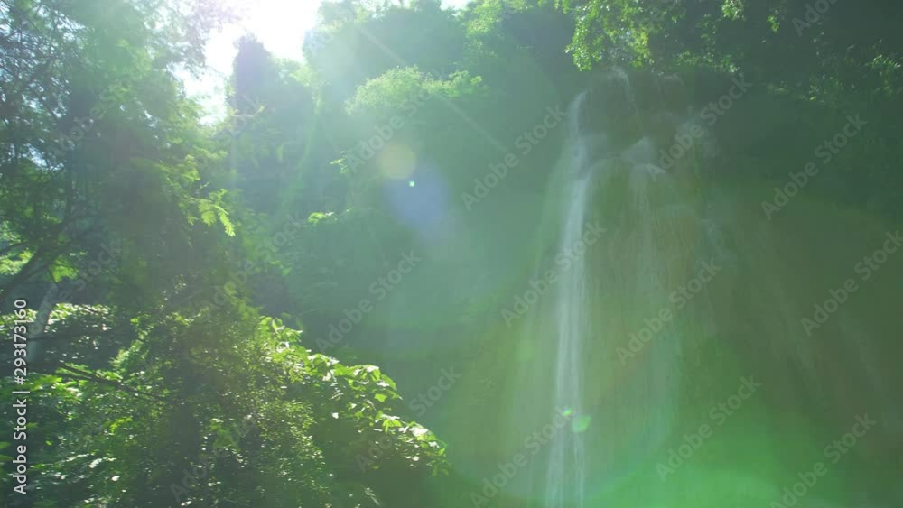 Amazing Unseen Waterfall view in deep forest Lush green leafes and sunshine in the morning. Saraburi Asia Thailand Amazing Unseen Waterfall view in deep forest Lush green leafes and sunshine in the morning. Saraburi Asia Thailand