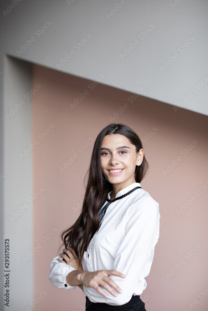Studio portrait of smiling positive business woman. Studio portrait of smiling positive business woman.