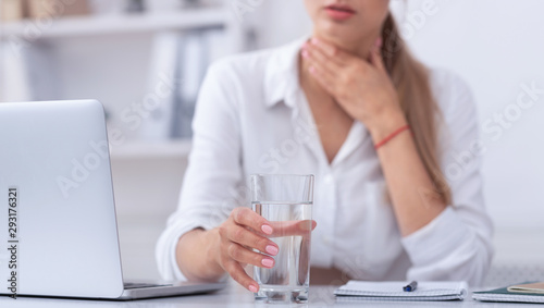 Unrecognizable Sick Girl Working On Laptop At Workplace, Cropped