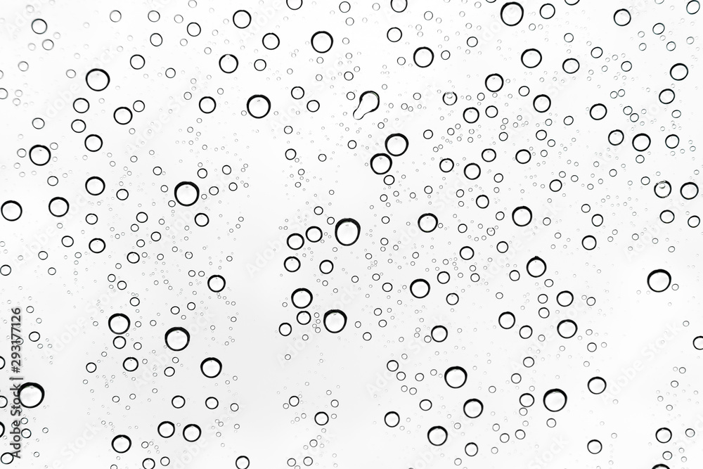 Rain drops on window glasses surface Natural Pattern of raindrops. Natural pattern of raindrops on white background for your design.