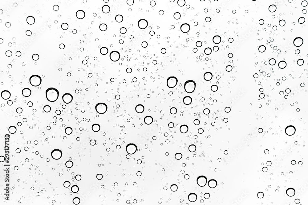 Rain drops on window glasses surface Natural Pattern of raindrops. Natural pattern of raindrops on white background for your design.