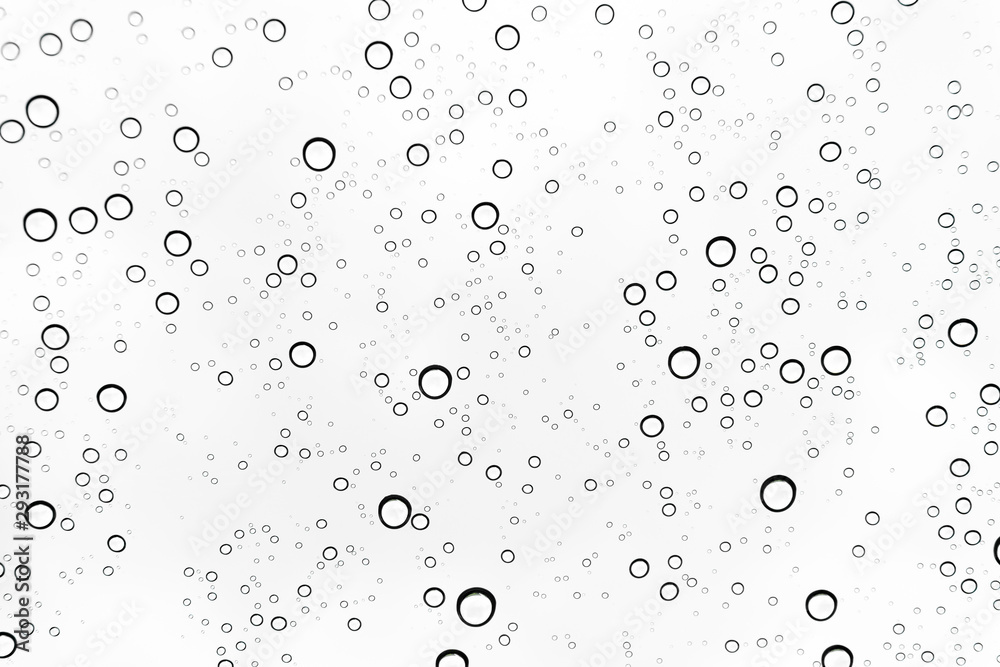 Rain drops on window glasses surface Natural Pattern of raindrops. Natural pattern of raindrops on white background for your design.