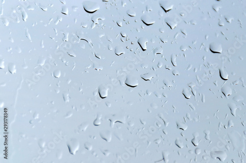 Background with drops of water on glass