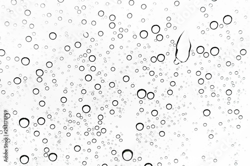 Rain drops on window glasses surface Natural Pattern of raindrops. Natural pattern of raindrops on white background for your design.