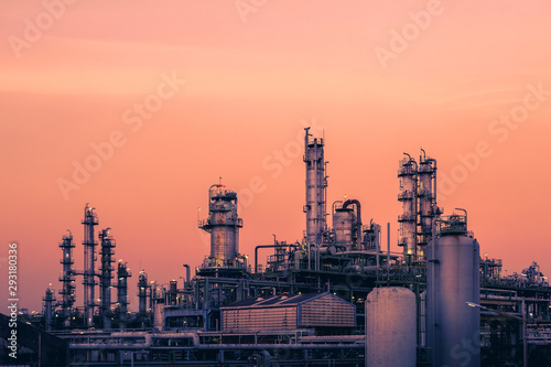 Petrochemical plant with sunset sky background, Oil and gas refinery plant, Manufacturing of petroleum industry