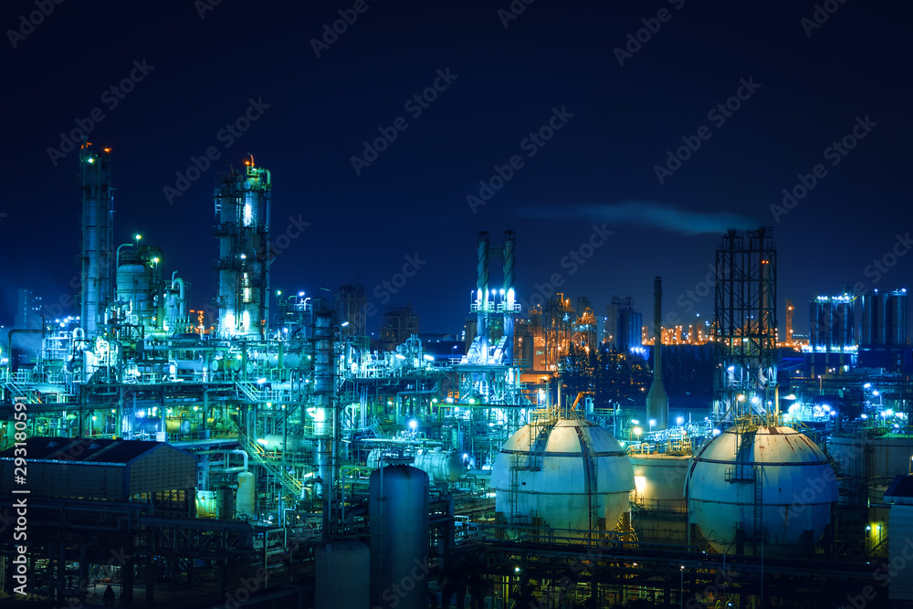Petrochemical industrial plant at night with colorful lighting, Manufacturing plant of petroleum industrial with glitter lighting