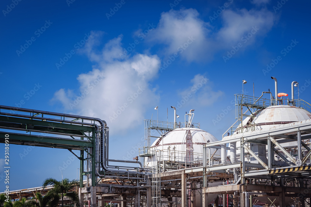 Industrial plant on blue sky with white cloud, Gas storage and pipeline