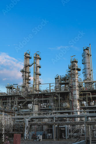 Distillation tower of Chemical industrial on blue sky background, Manufacturing of petrochemical industrial plant