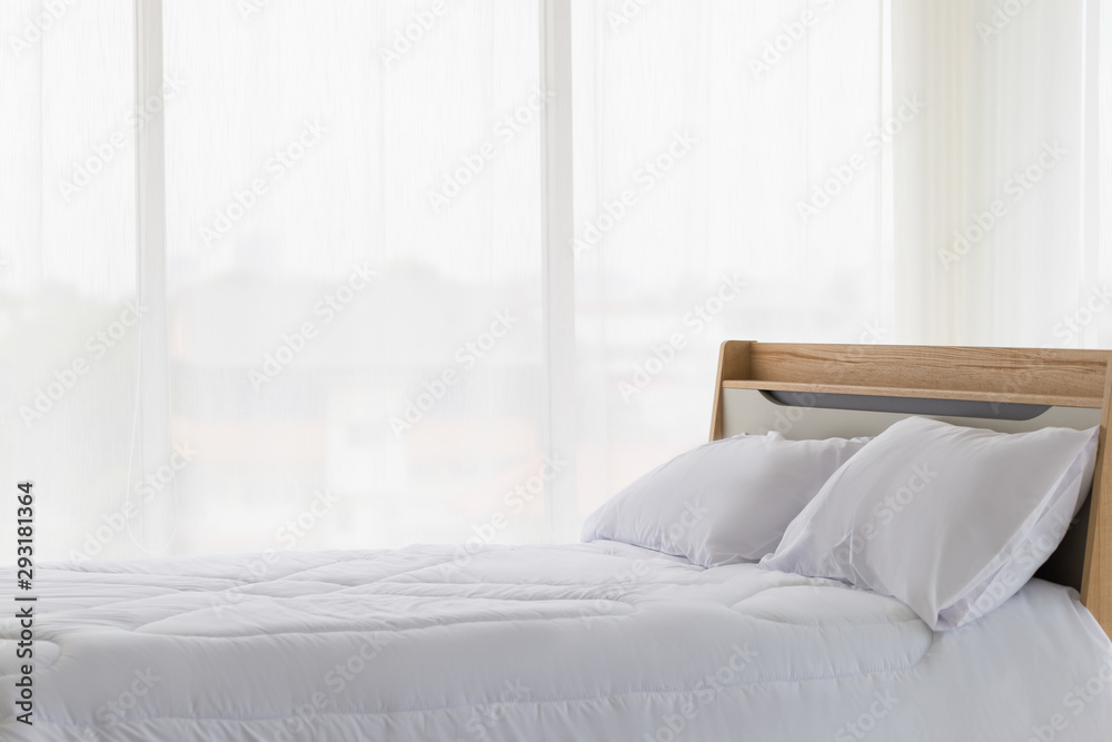 Close up empty bed with pillows and blanket in the bedroom. Close up empty bed with pillows and blanket in the bedroom.