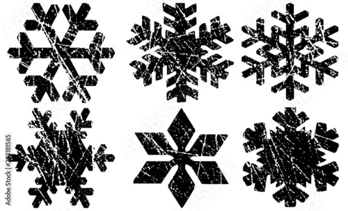 Grunge Textured Snowflakes Collection. Can be used as Banners, Insignias or Badges. Vector Distressed Texture Set. Blank Geometric Shapes. Vector Illustration. Black isolated on white. EPS10.