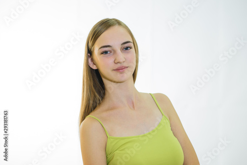 Beautiful young fair-haired girl with well-groomed skin. Studio shot
