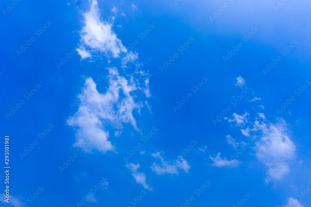 Clear blue sky with white cloud background in the morning. Good weather background.