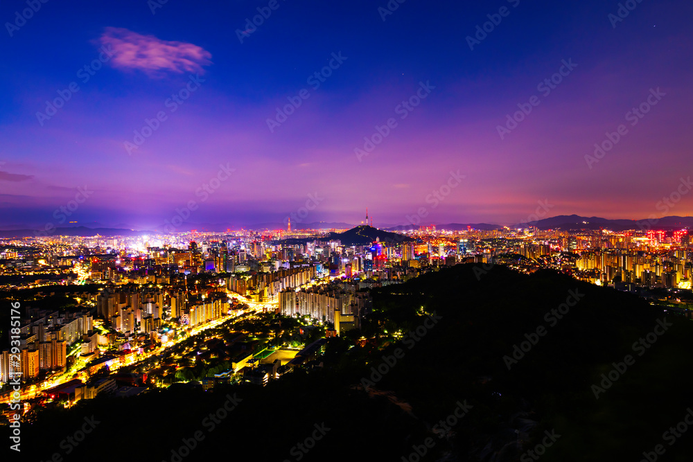Twilight of Seoul Downtown cityscape . Aerial view of Nansan Seoul Tower and lotte tower. Viewpoint from Ansan mountain best landmark of Seoul , South Korea