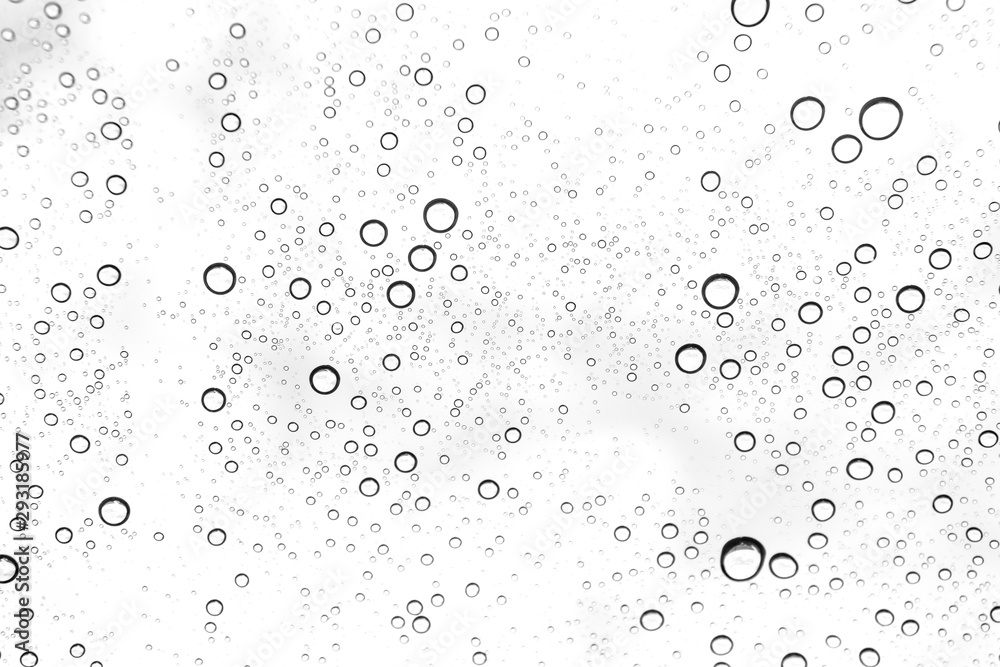 Rain drops on window glasses surface Natural Pattern of raindrops. Natural pattern of raindrops on white background for your design. Rain drops on window glasses surface Natural Pattern of raindrops. Natural pattern of raindrops on white background for your design.