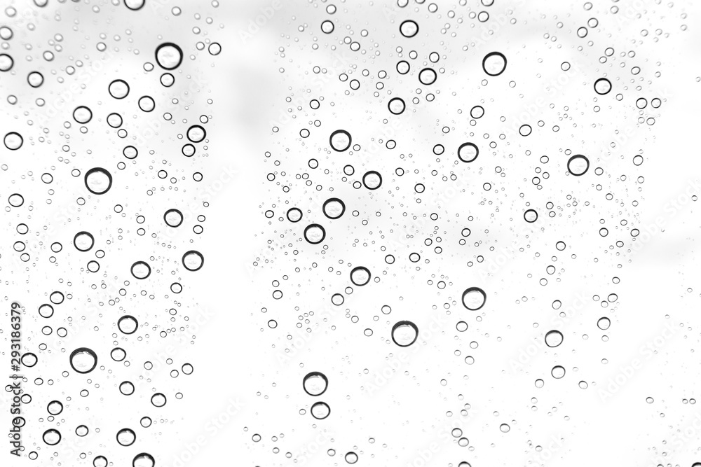 Rain drops on window glasses surface Natural Pattern of raindrops. Natural pattern of raindrops on white background for your design.