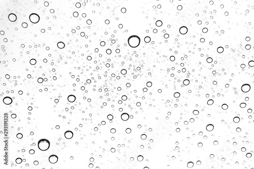 Rain drops on window glasses surface Natural Pattern of raindrops. Natural pattern of raindrops on white background for your design.