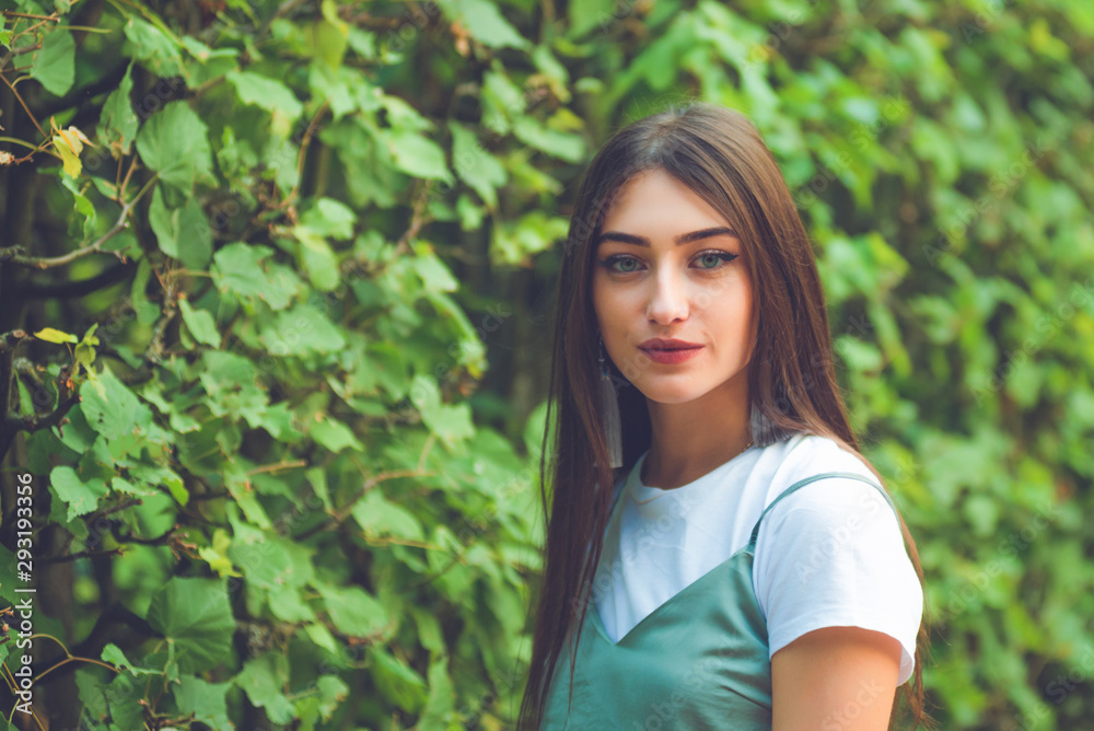 Young beautiful woman outdoors portrait. Cute woman smile. Young beautiful woman outdoors portrait. Cute woman smile.