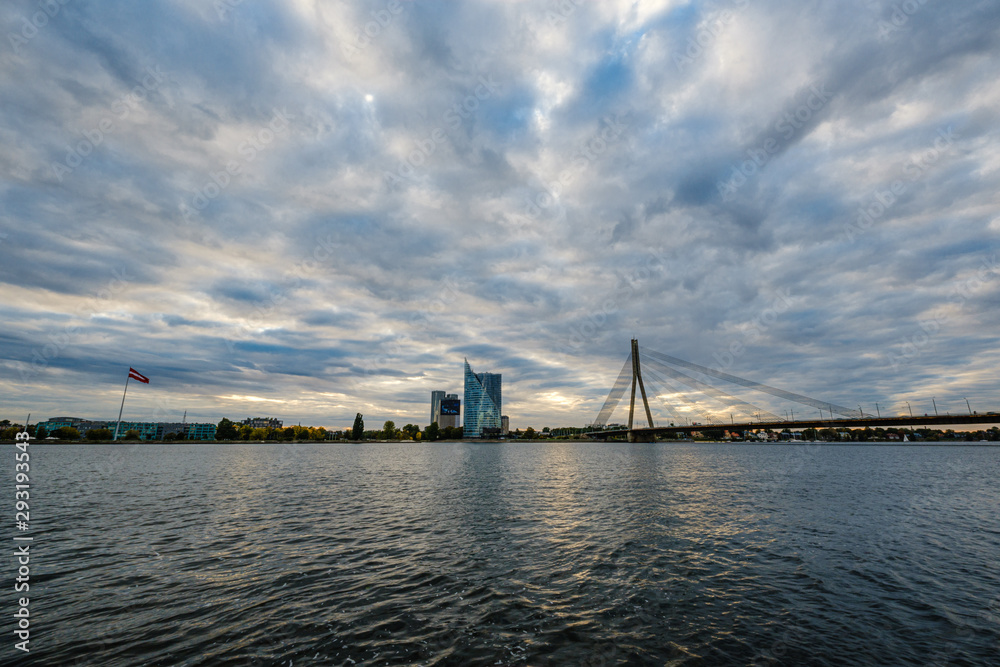 panoramic view of Riga city in Latvia. Capital of Latvia at nightfall with red sunset panoramic view of Riga city in Latvia. Capital of Latvia at nightfall with red sunset