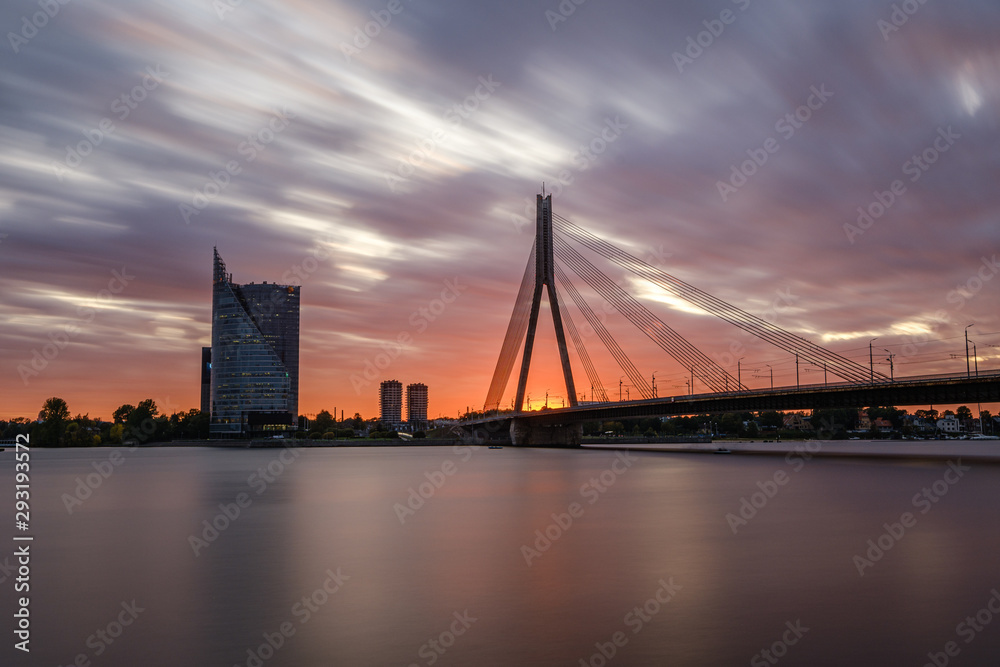 panoramic view of Riga city in Latvia. Capital of Latvia at nightfall with red sunset