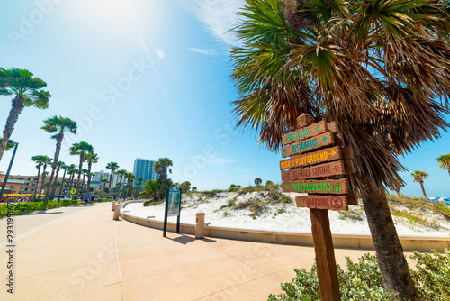 Wooden direction and distance signs in beautiful Clearwater seafront photo