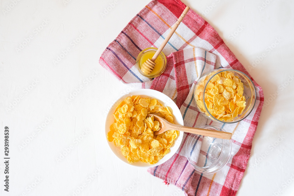 Traditional breakfast cereal of cornflakes and milk with a banana. Healthy lifestyle food. Traditional breakfast cereal of cornflakes and milk with a banana. Healthy lifestyle food.
