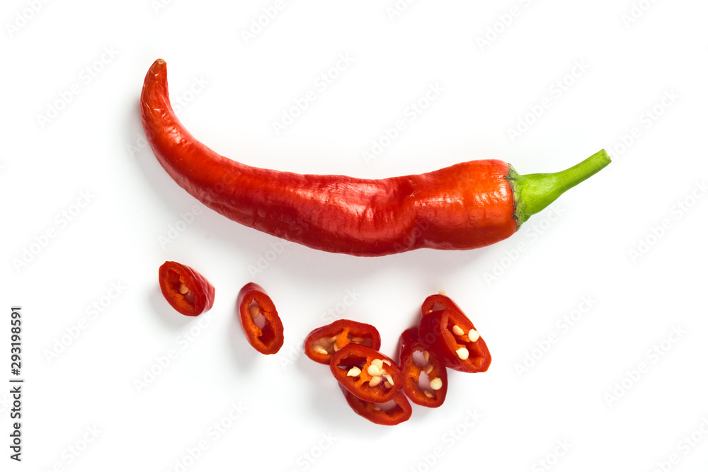 Closeup top view red chili pepper with sliced on white background, raw food ingredient concept Closeup top view red chili pepper with sliced on white background, raw food ingredient concept