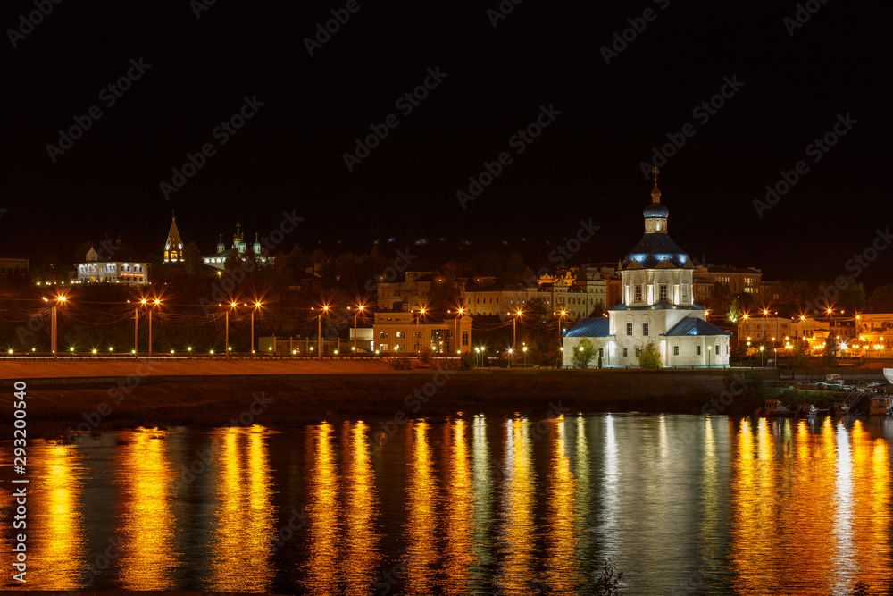 old town in Cheboksary with reflections on the water, shot on an autumn evening